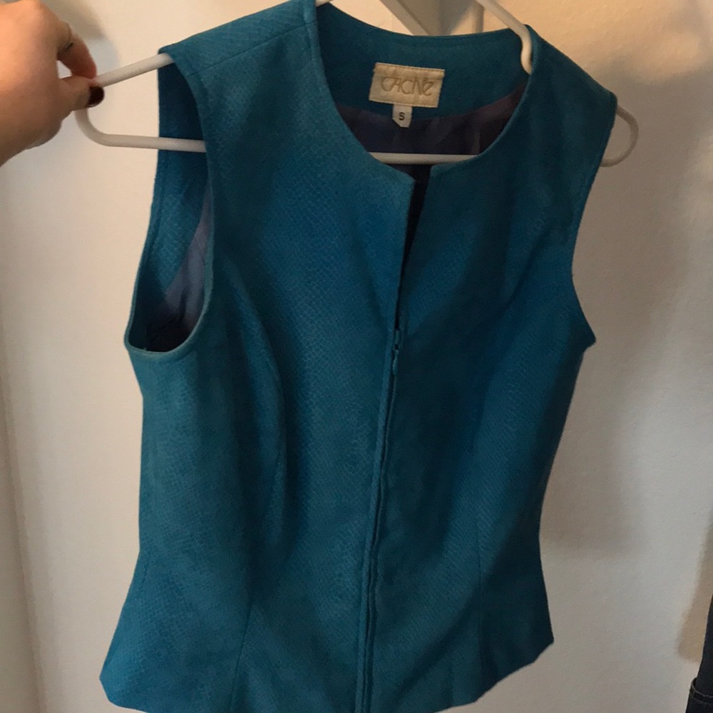 Matching turquoise vest and pants. Vest is a S